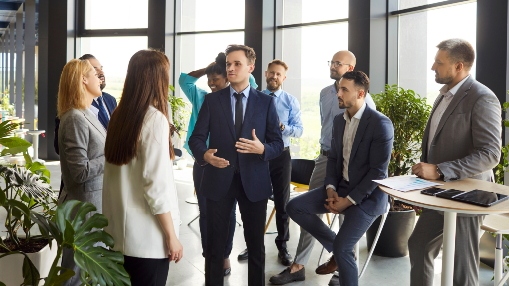 Group of people talking in a business setting