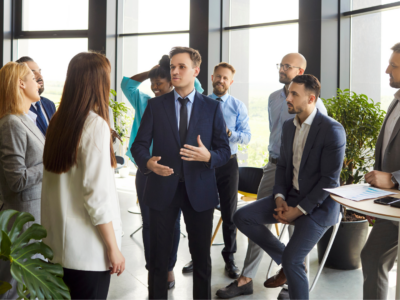 Group of people talking in a business setting